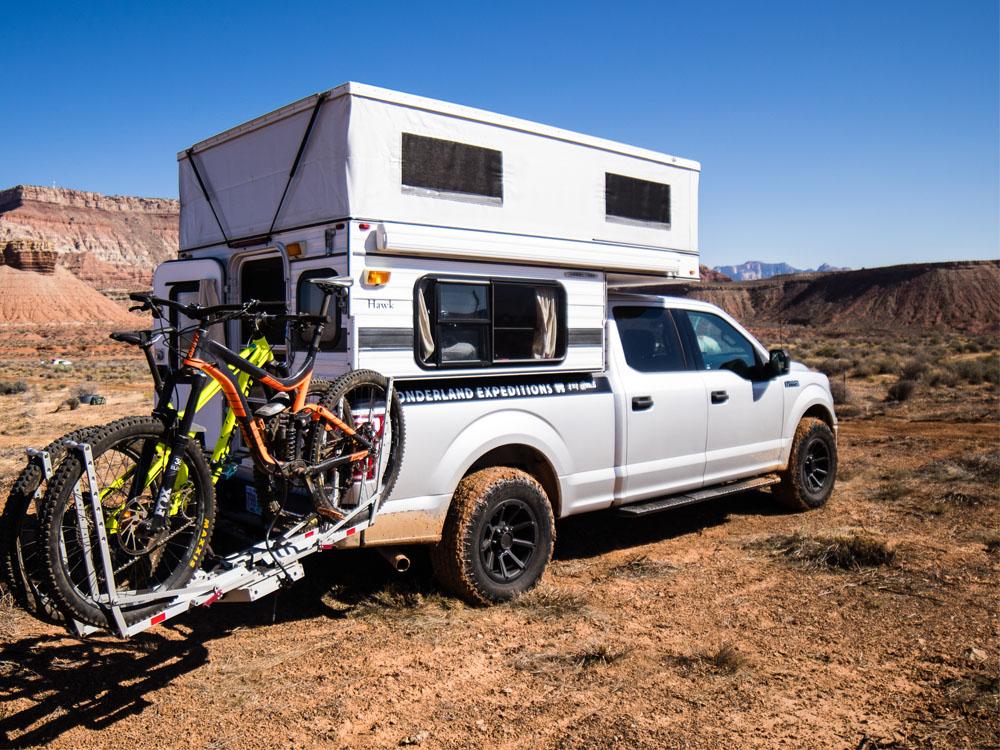 Slide in truck camper with bike rack