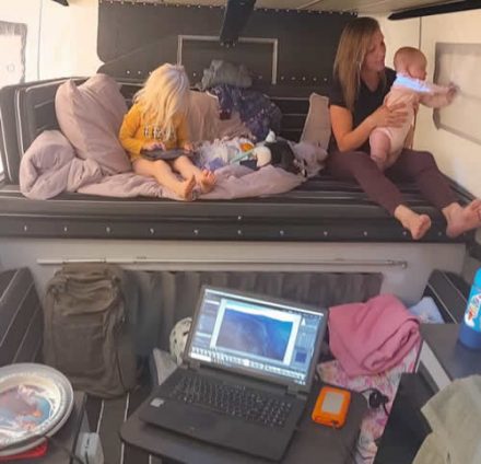Family in PopUp Four Wheel Camper